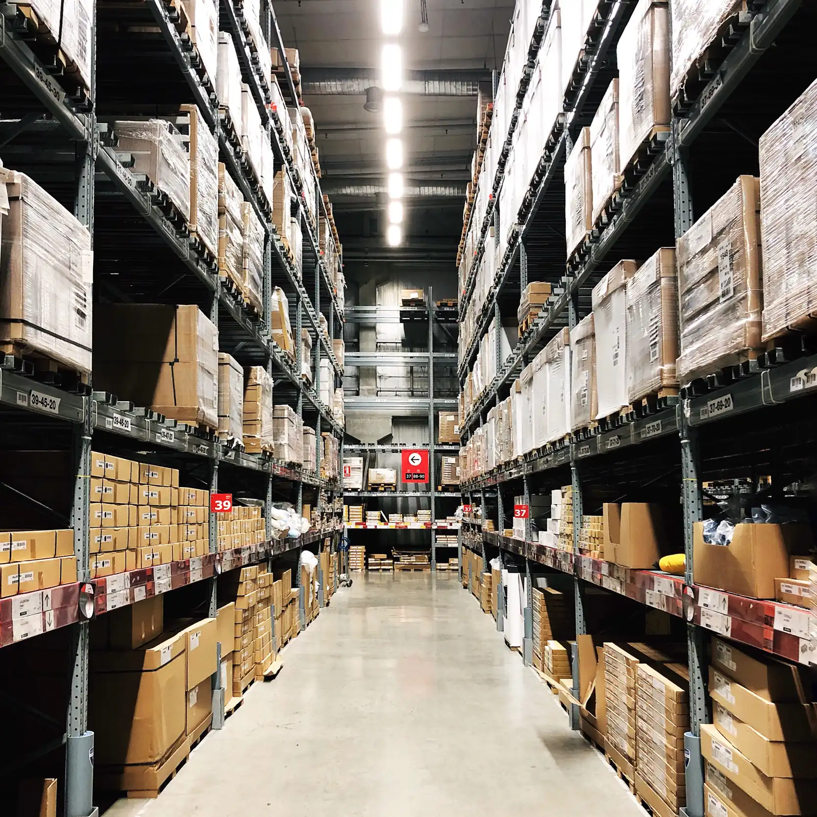 Warehouse with organized inventory shelves representing AI-driven logistics and retail automation